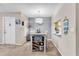 Dining area with table, chairs, and kitchen pass-through at 3141 Lake Pine Way # D2, Tarpon Springs, FL 34688