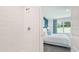 Clean bathroom with a walk-in shower and view to bedroom at 33174 Osprey Peak Way, San Antonio, FL 33576