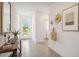Bright and airy entryway with tile floors and access to the backyard at 33174 Osprey Peak Way, San Antonio, FL 33576
