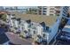 Aerial view of a waterfront building complex with parking at 400 Island Way # 1204, Clearwater, FL 33767