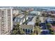 Aerial view of a community with multiple buildings and lush landscaping at 400 Island Way # 1204, Clearwater, FL 33767