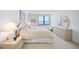 Main bedroom with large window and water views at 400 Island Way # 1204, Clearwater, FL 33767
