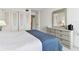 Bedroom features built-in dresser and large closet at 400 Island Way # 1204, Clearwater, FL 33767