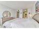 King-size bed in well-lit bedroom with dresser at 400 Island Way # 1204, Clearwater, FL 33767