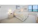 Bedroom with large window and water view at 400 Island Way # 1204, Clearwater, FL 33767