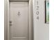 Modern entry door with sleek, numbered address at 400 Island Way # 1204, Clearwater, FL 33767