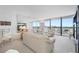 Spacious living room with stunning water views at 400 Island Way # 1204, Clearwater, FL 33767