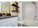 Clean bathroom with white subway tile and bathtub at 492 Santa Cruz Ne Pl # D, St Petersburg, FL 33703