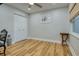 Bright bedroom with hardwood floors and double door closet at 492 Santa Cruz Ne Pl # D, St Petersburg, FL 33703