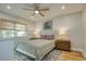 Bright bedroom with hardwood floors and neutral color palette at 492 Santa Cruz Ne Pl # D, St Petersburg, FL 33703