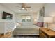 Second bedroom with hardwood floors and large window at 492 Santa Cruz Ne Pl # D, St Petersburg, FL 33703