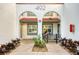 Condo entry with arched entryway and private patio at 492 Santa Cruz Ne Pl # D, St Petersburg, FL 33703