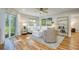 Bright living room with hardwood floors and comfy furniture at 492 Santa Cruz Ne Pl # D, St Petersburg, FL 33703
