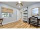 Home office with built in shelving and hardwood floors at 492 Santa Cruz Ne Pl # D, St Petersburg, FL 33703