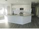 Spacious kitchen featuring a large island and granite countertops at 504 Magnolia Pointe Ct, Seffner, FL 33584