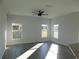 Bright and airy living room with hardwood floors and lots of natural light at 504 Magnolia Pointe Ct, Seffner, FL 33584
