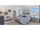Main bedroom with a king-size bed and window at 5246 Salt Marsh Rd, Wimauma, FL 33598
