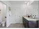 Bright bathroom with toilet and double vanity at 5249 Salt Marsh Rd, Wimauma, FL 33598