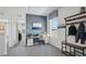 Home office features a desk, chair, and built-in shelving at 5249 Salt Marsh Rd, Wimauma, FL 33598