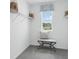 Large walk-in closet with shelving and bench at 5249 Salt Marsh Rd, Wimauma, FL 33598