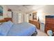 Main bedroom with double bed and ensuite bathroom at 5725 80Th N St # 116, St Petersburg, FL 33709