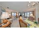 Combined living and dining area with ample natural light at 5725 80Th N St # 116, St Petersburg, FL 33709