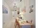 Bright entryway with desk and charming wall art at 5725 80Th N St # 116, St Petersburg, FL 33709