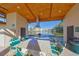 Outdoor kitchen with granite countertop and seating at 5725 80Th N St # 116, St Petersburg, FL 33709