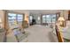 Spacious living room with lots of natural light and comfortable seating at 5725 80Th N St # 116, St Petersburg, FL 33709
