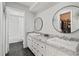 Updated bathroom with double vanity and granite countertops at 6327 2Nd S Ave, St Petersburg, FL 33707