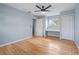 Bright bedroom with hardwood floors and ceiling fan at 6327 2Nd S Ave, St Petersburg, FL 33707