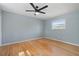 Spacious bedroom featuring hardwood floors and a ceiling fan at 6327 2Nd S Ave, St Petersburg, FL 33707