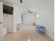 Versatile bonus room with tile floors and ceiling fan at 6327 2Nd S Ave, St Petersburg, FL 33707