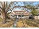 Charming raised ranch home with mature landscaping and large oak tree at 6327 2Nd S Ave, St Petersburg, FL 33707