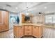 Spacious kitchen featuring an island and light wood cabinets at 6327 2Nd S Ave, St Petersburg, FL 33707