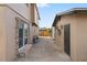 Side yard access with stone pathway at 6327 2Nd S Ave, St Petersburg, FL 33707
