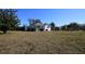House exterior view, showcasing a spacious yard at 801 Woodruff Ave, Clearwater, FL 33756