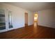 Living room with hardwood floors and French doors at 801 Woodruff Ave, Clearwater, FL 33756