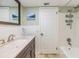 Updated bathroom with new vanity and tiled shower/tub at 11398 88Th Ave, Seminole, FL 33772