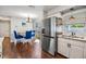 Modern kitchen with stainless steel appliances and white cabinets at 11398 88Th Ave, Seminole, FL 33772