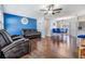 Open concept living room and dining area with hardwood floors at 11398 88Th Ave, Seminole, FL 33772