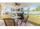 Relaxing screened patio with seating and grill at 11398 88Th Ave, Seminole, FL 33772