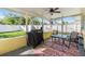 Outdoor space with table, chairs, and grill at 11398 88Th Ave, Seminole, FL 33772