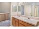 Bathroom with double vanity and mirror at 1241 Redondo Way, Wesley Chapel, FL 33543