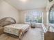 Spacious bedroom with large window and ample closet space at 1241 Redondo Way, Wesley Chapel, FL 33543