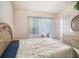 Bright bedroom with a large window and closet space at 1241 Redondo Way, Wesley Chapel, FL 33543