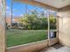 Screened patio overlooking backyard and green space at 1241 Redondo Way, Wesley Chapel, FL 33543