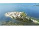 Aerial view of a waterfront island with lush vegetation at 1250 S Pinellas Ave # 713, Tarpon Springs, FL 34689