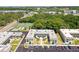 Aerial view of community, tennis courts, and parking at 1250 S Pinellas Ave # 713, Tarpon Springs, FL 34689