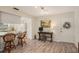 Kitchen with breakfast bar, light cabinets, and a small desk area at 1250 S Pinellas Ave # 713, Tarpon Springs, FL 34689